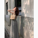 Ndyad and white plaid suspender dress with slim waist and French retro temperament medium-length skirt HZ1024