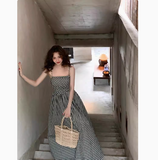 Ndyad and white plaid suspender dress with slim waist and French retro temperament medium-length skirt HZ1024