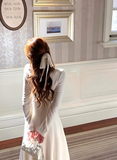Ndyad Gardenia White Tea can be worn with a white long-sleeved knitted dress HZ1024
